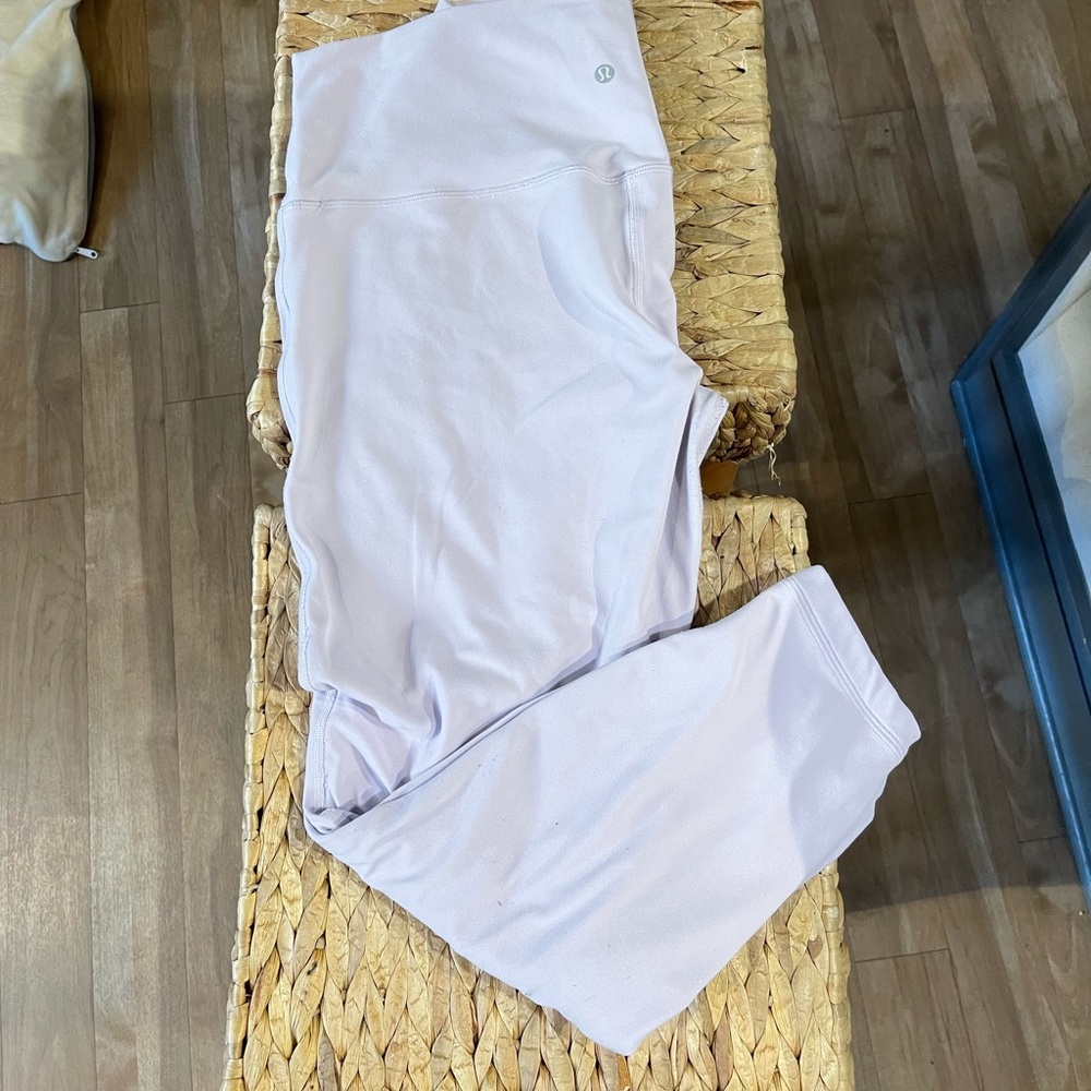Lilac Lulu aligns, good used condition, runs big, fits like 16